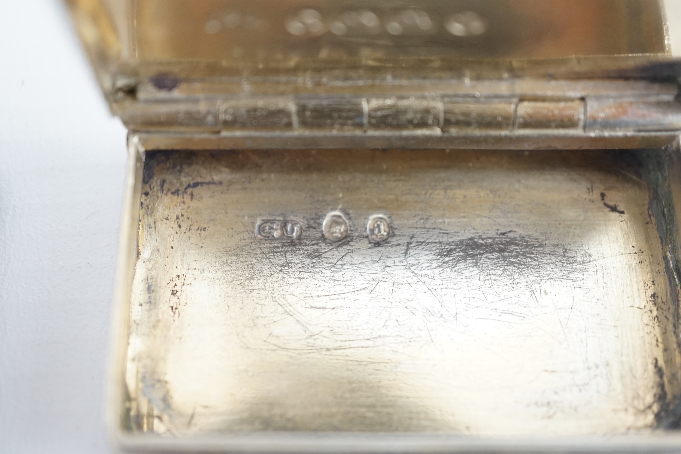 A George IV silver snuff box, with engraved initials, Thomas Shaw?, Birmingham, 1826, 54mm, together with a Victorian silver snuff box, George Unite, Birmingham, 1875.